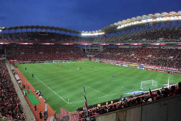 Wie man mit dem Handy bessere Fußballspielfotos von der Tribüne aus macht