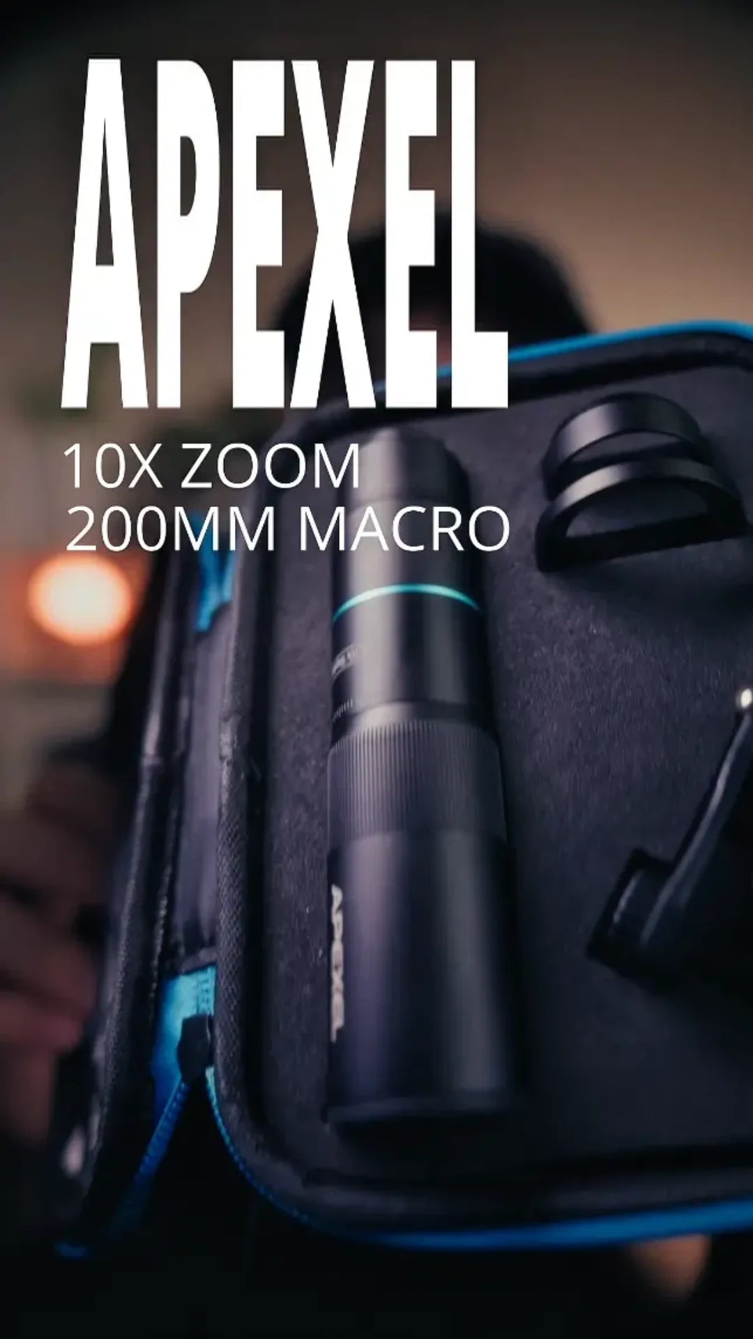 Apexel camera lens with 10x zoom and 200mm macro text on a dark background