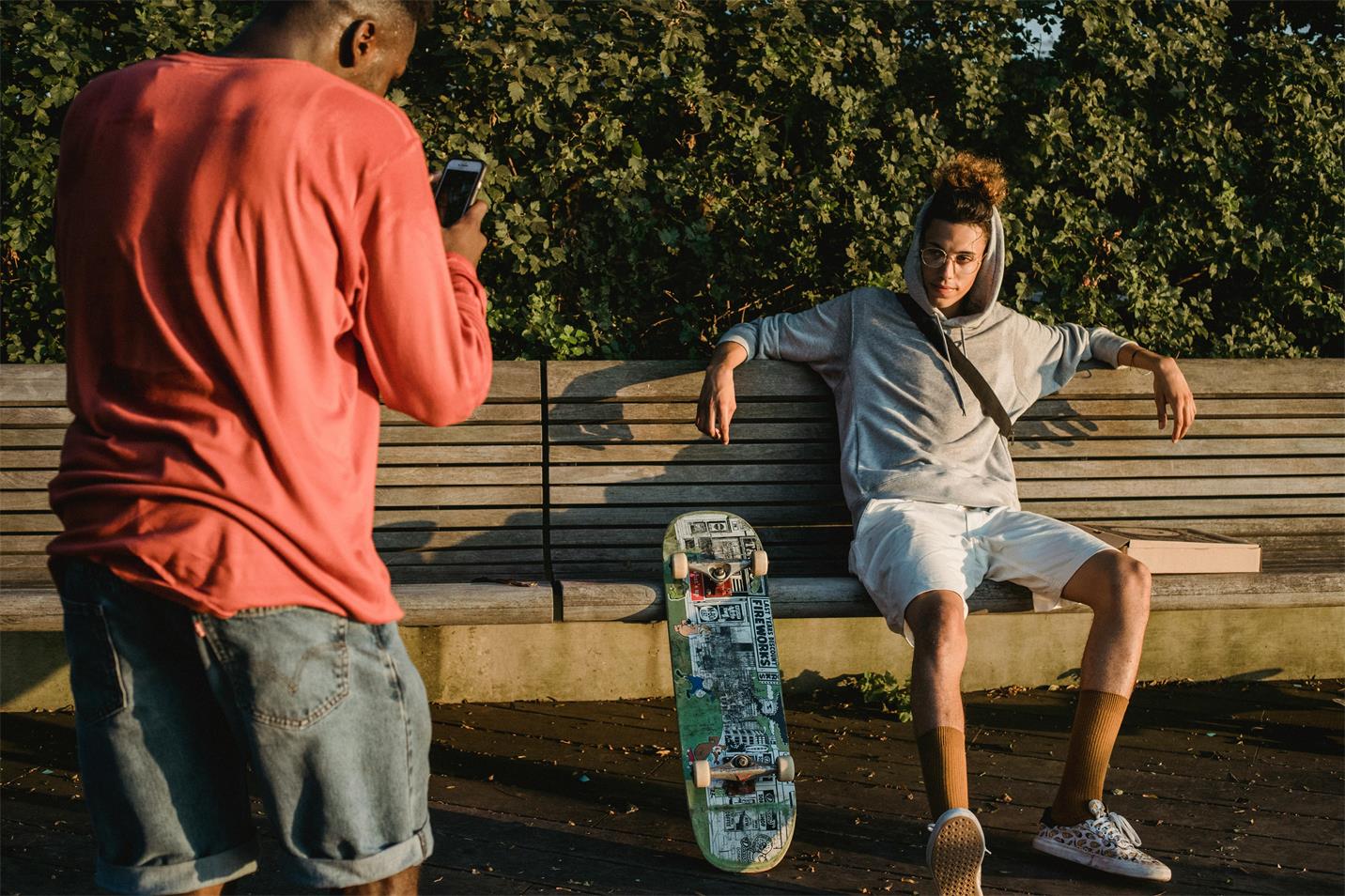 A man capturing a skateboarder in action. Reviews, Apexel.